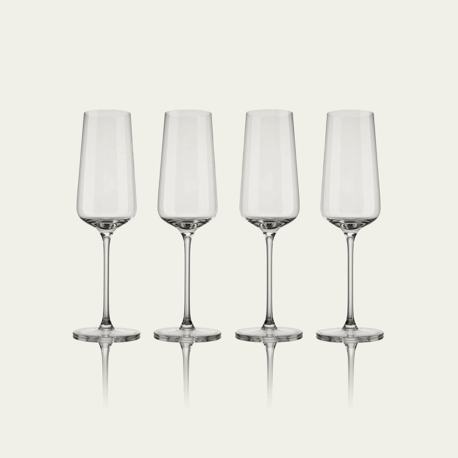 Elegant flute glasses arranged for a formal event, showcasing crystal-clear clarity and refined design