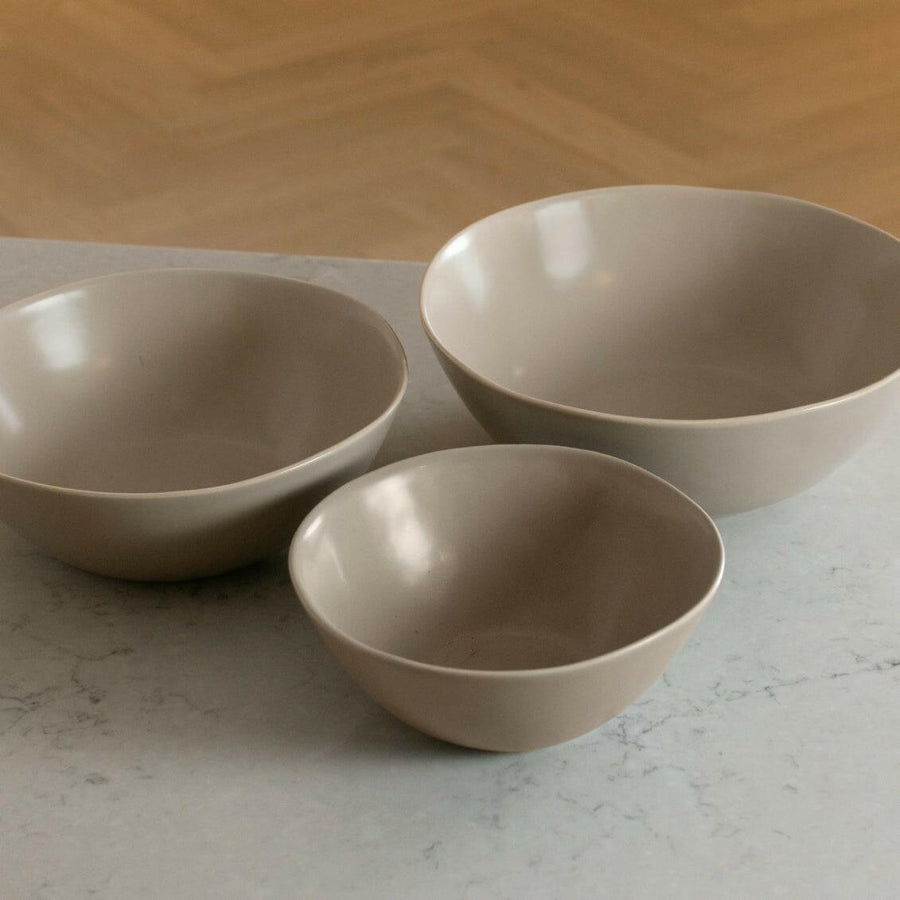 Nested serving trays elegantly arranged, showcasing functionality and style for sophisticated dining experiences.