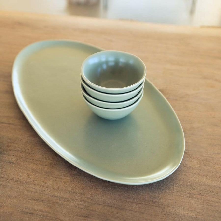 Elegant serving ceramics set showcasing fine craftsmanship and stylish tableware for sophisticated dining experiences.