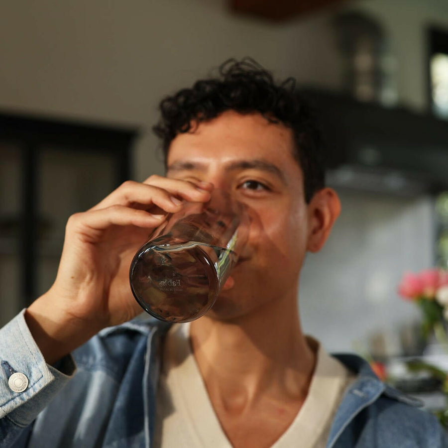 Tall person wearing stylish glasses, showcasing elegance and fashion in eyewear accessories.