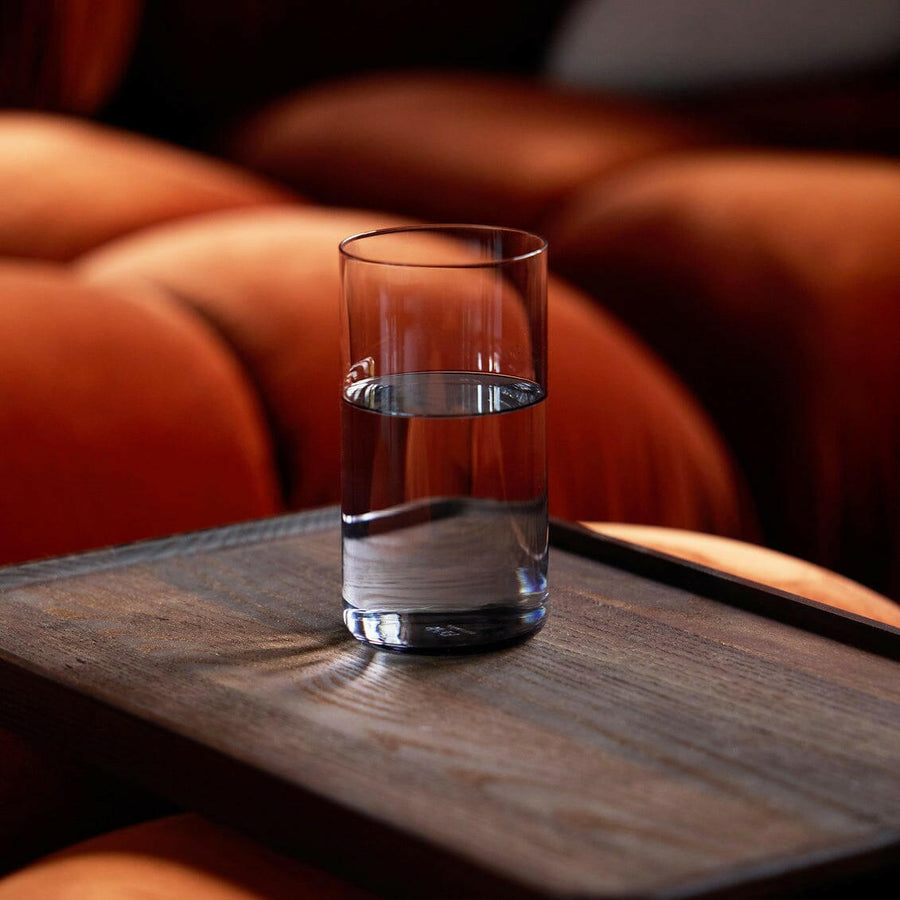 Tall person wearing stylish glasses, showcasing elegance and fashion in eyewear accessories.