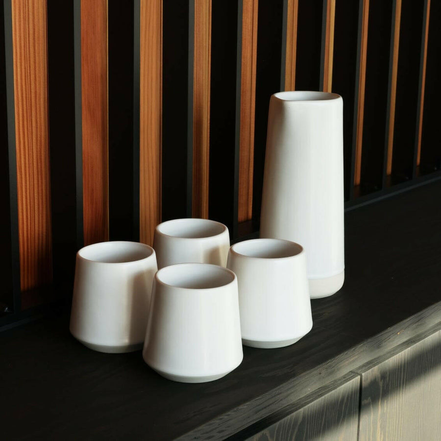 Elegant glass carafe filled with fresh water, perfect for dining table settings and enhancing beverage presentation