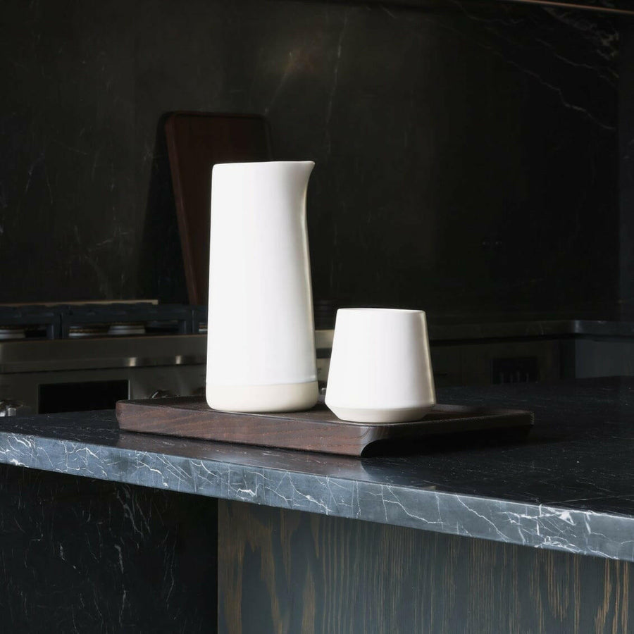 Elegant glass carafe filled with fresh water, perfect for dining table settings and enhancing beverage presentation