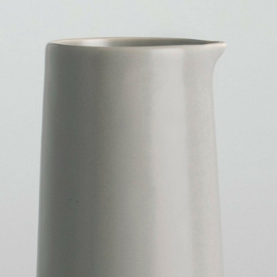 Elegant glass carafe filled with fresh water, perfect for dining table settings and enhancing beverage presentation