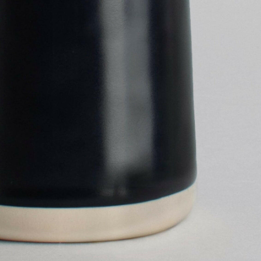 Elegant glass carafe filled with fresh water, perfect for dining table settings and enhancing beverage presentation