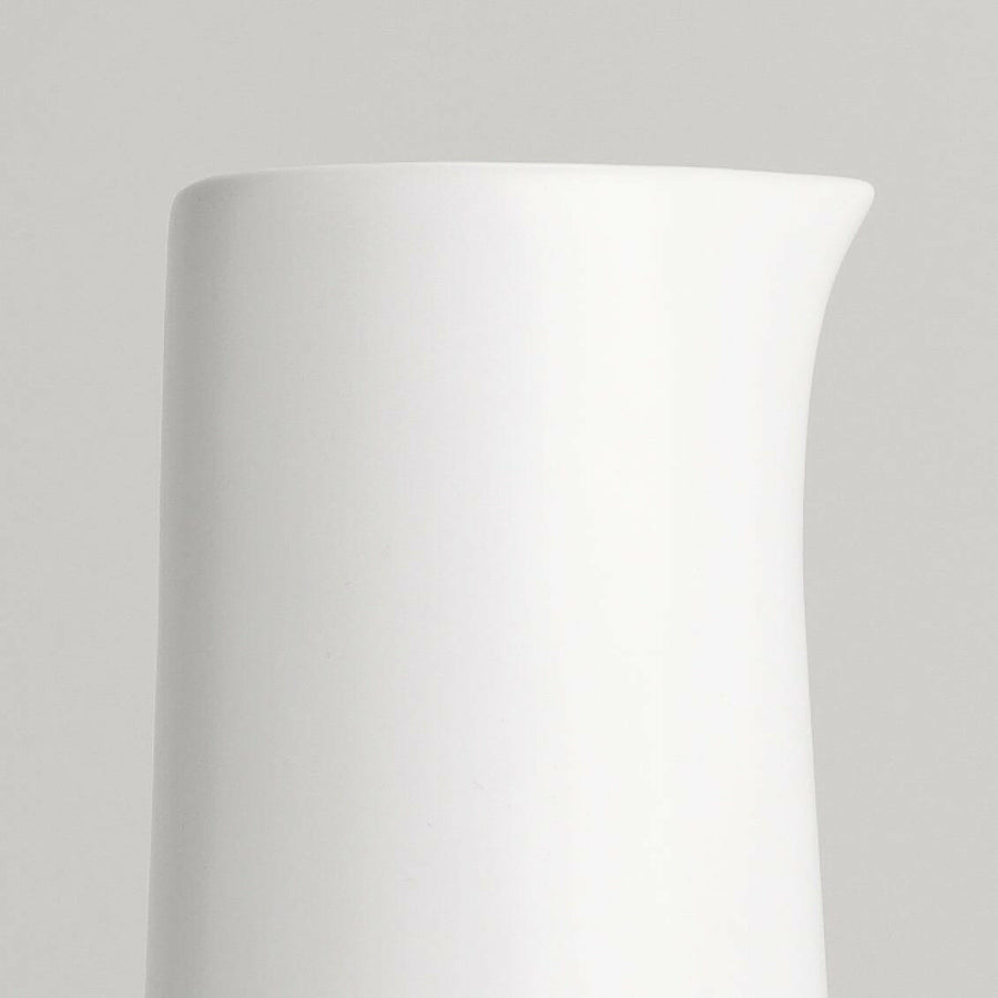 Elegant glass carafe filled with fresh water, perfect for dining table settings and enhancing beverage presentation