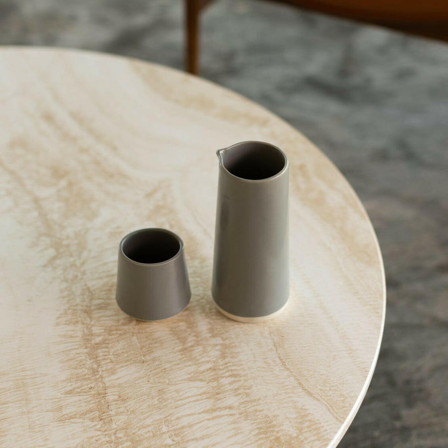 Elegant glass carafe filled with fresh water, perfect for dining table settings and enhancing beverage presentation