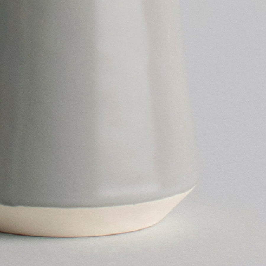 Elegant glass carafe filled with fresh water, perfect for dining table settings and enhancing beverage presentation