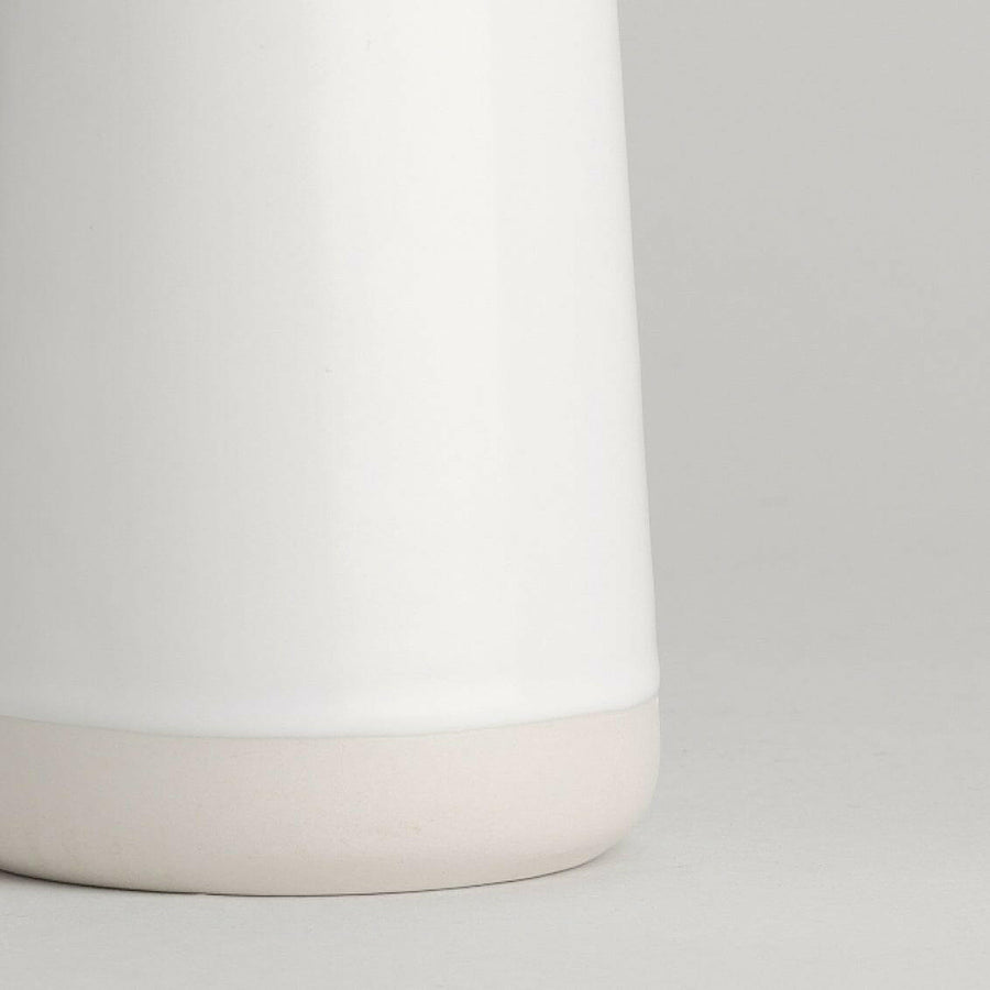 Elegant glass carafe filled with fresh water, perfect for dining table settings and enhancing beverage presentation