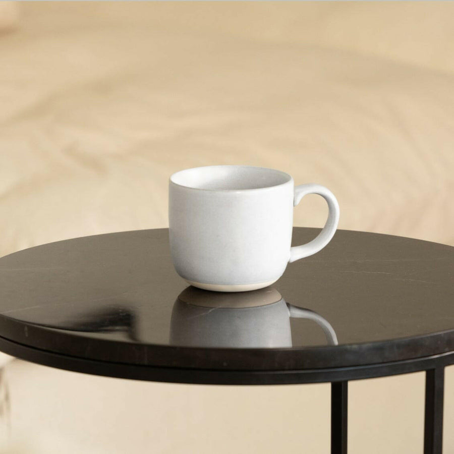 Elegant ceramic mugs perfect for hot beverages, ideal for office and home use with stylish design.