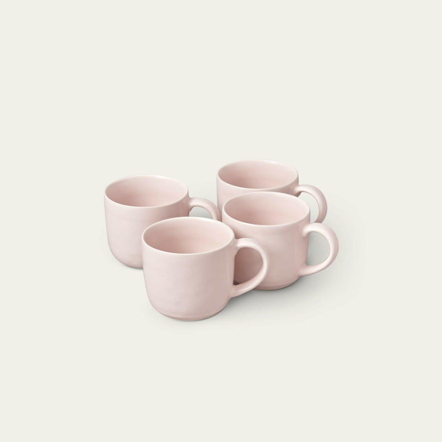 Elegant ceramic mugs perfect for hot beverages, ideal for office and home use with stylish design.