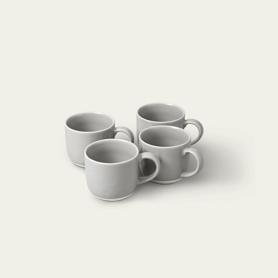 Elegant ceramic mugs perfect for hot beverages, ideal for office and home use with stylish design.