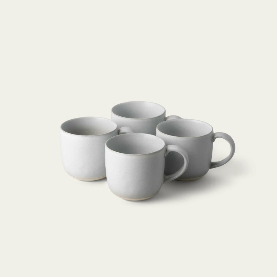 Elegant ceramic mugs perfect for hot beverages, ideal for office and home use with stylish design.