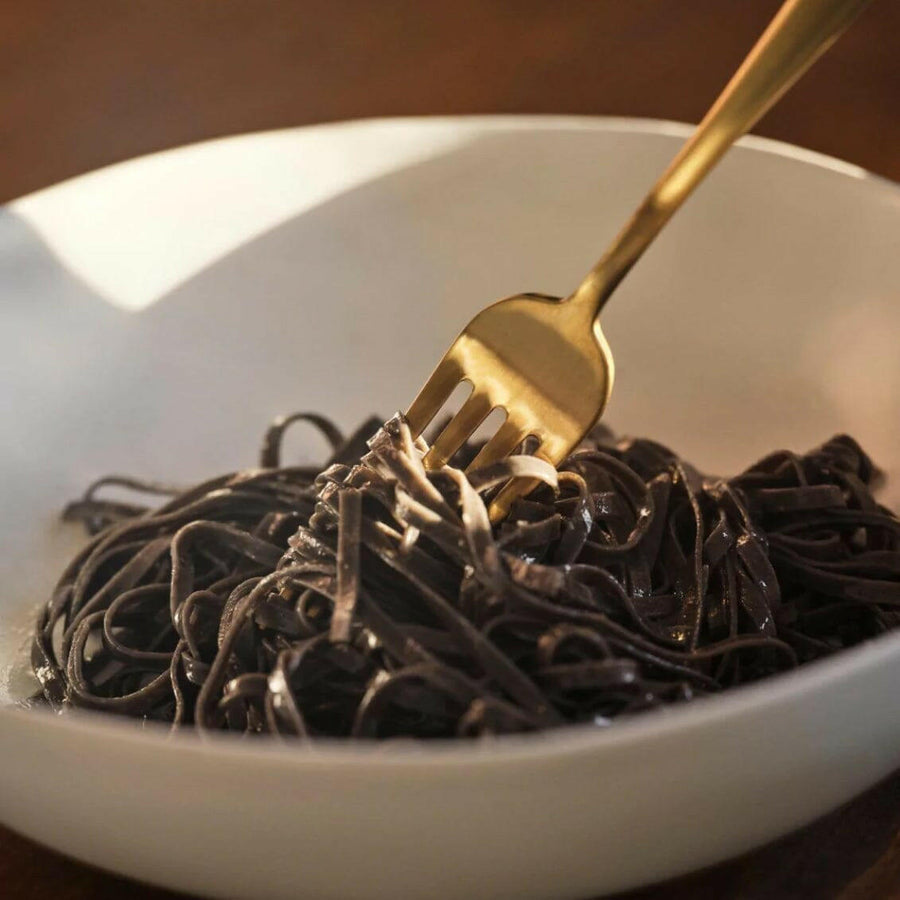 Freshly prepared pasta served in elegant bowls, showcasing authentic Italian cuisine and fine dining presentation