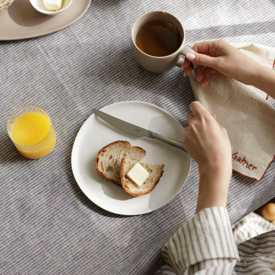 Fresh garden salad served on elegant plates, perfect for a healthy and stylish meal presentation.
