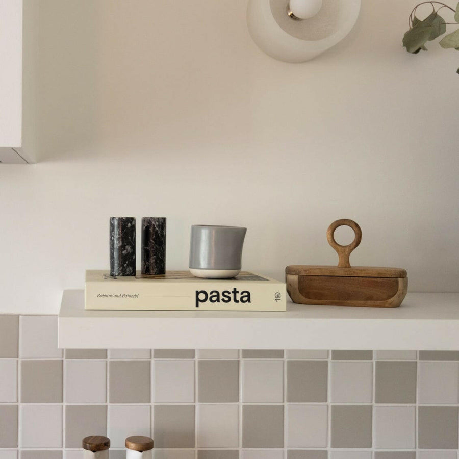 Elegant small carafe for serving beverages, perfect for home or office use enhancing presentation and convenience.