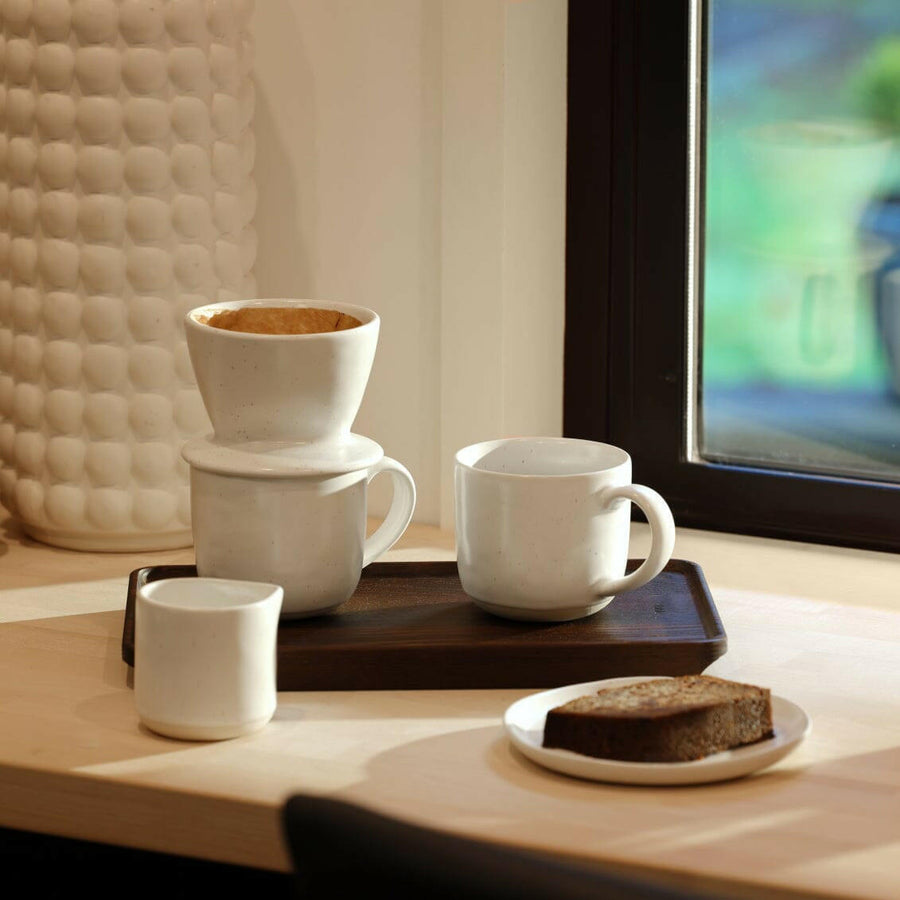 Elegant small carafe for serving beverages, perfect for home or office use enhancing presentation and convenience.