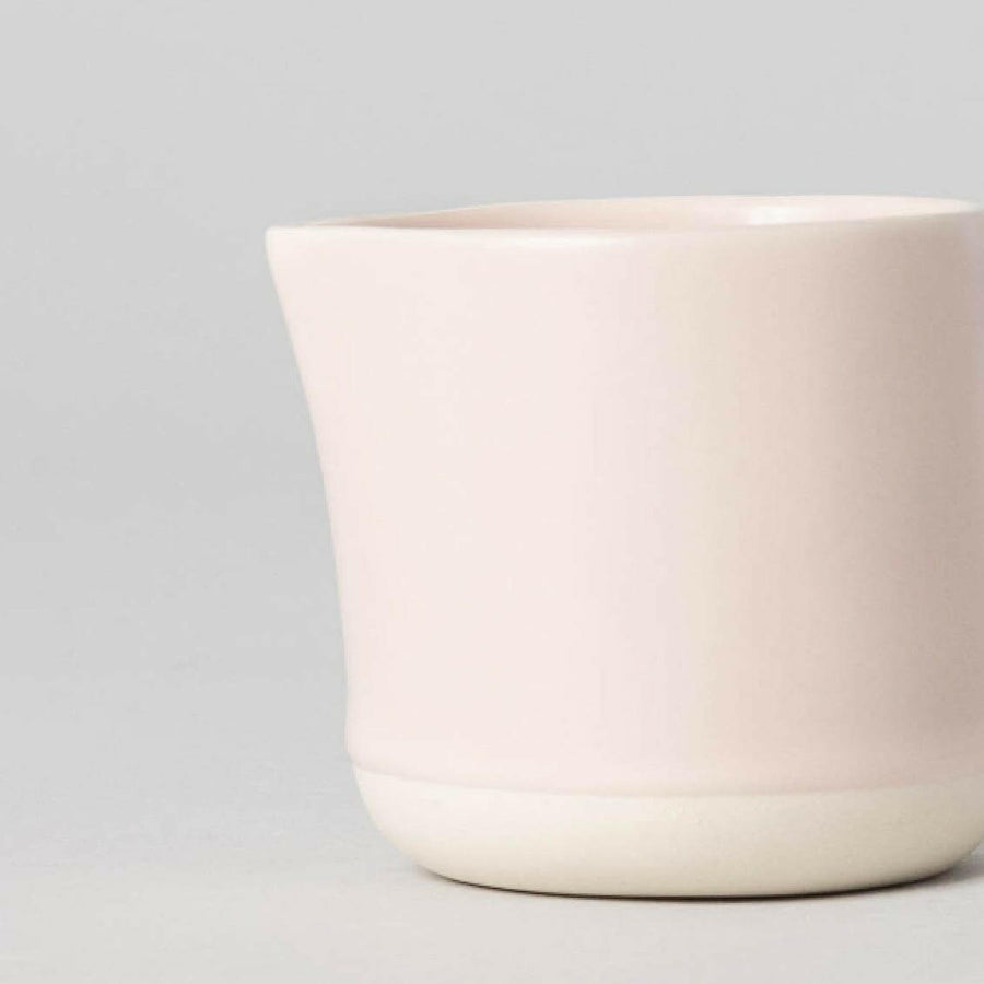 Elegant small carafe for serving beverages, perfect for home or office use enhancing presentation and convenience.