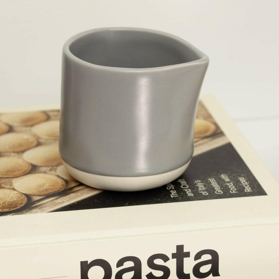 Elegant small carafe for serving beverages, perfect for home or office use enhancing presentation and convenience.