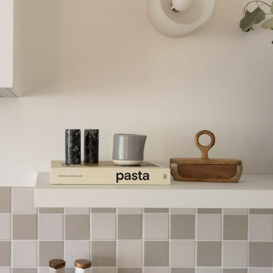 Elegant small carafe for serving beverages, perfect for home or office use enhancing presentation and convenience.